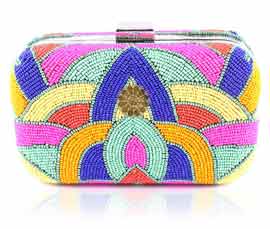 Vogue Crafts and Designs Pvt. Ltd. manufactures Fancy Multicolor Clutch at wholesale price.